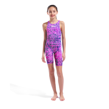 Load image into Gallery viewer, Full-length of a girl in an arena pink and purple snakeskin Powerskin ST NEXT racing suit