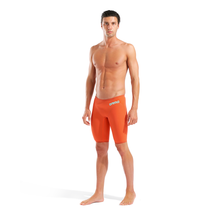Load image into Gallery viewer, Man wearing orange racing jammers with teal arena branding