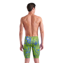 Load image into Gallery viewer, Back of a man in an arena green and blue snakeskin Powerskin ST NEXT racing suit
