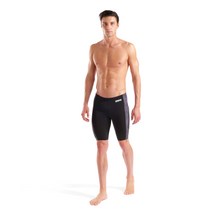 Load image into Gallery viewer, Man wearing black swim jammers on a white background