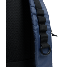 Load image into Gallery viewer, Close-up of a blue backpack with black D-buckle strap and mesh material on a white background