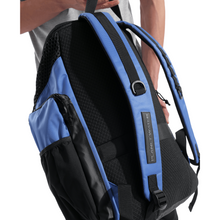 Load image into Gallery viewer, Blue and black backpack held by a person on a white background