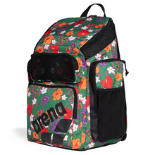Load image into Gallery viewer, Top-loading floral-patterned green, red, orange, purple, white backpack with 'arena' branding on a white background