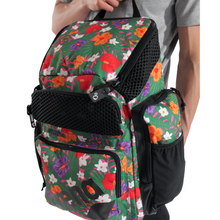 Load image into Gallery viewer, Person holding a floral-patterned backpack with colorful flowers on a white background