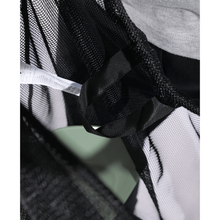 Load image into Gallery viewer, Close-up of a black mesh bag with swim equipment inside