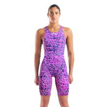 Load image into Gallery viewer, Woman in an arena pink and purple snakeskin Powerskin ST NEXT racing suit