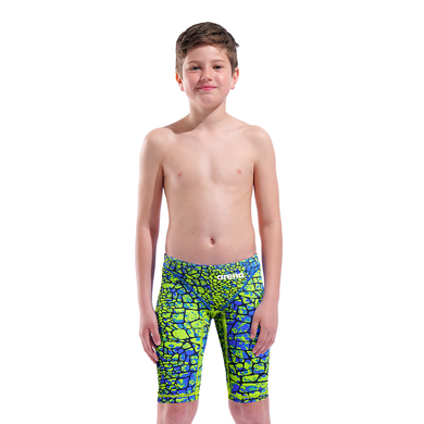 Boy in an arena green and blue snakeskin Powerskin ST NEXT racing suit
