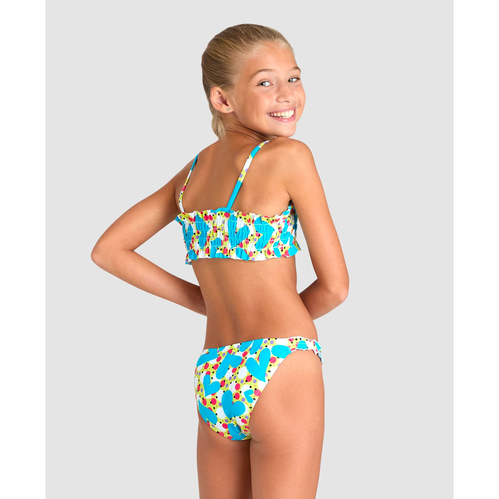 Girl in swimsuit ARENA GIRLS' VINTAGE BANDEAU BIKINI - SOFT GREEN/MULTI – OntarioSwimHub