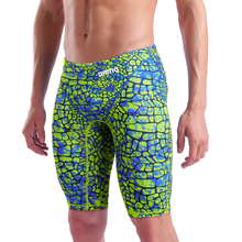 Load image into Gallery viewer, Close-up of a man in an arena green and blue snakeskin Powerskin ST NEXT racing suit
