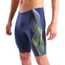 Load image into Gallery viewer, Blue athletic swim jammers with green geometric pattern on a white background
