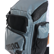 Load image into Gallery viewer, Sage green backpack with multiple pockets and mesh sections on a white background
